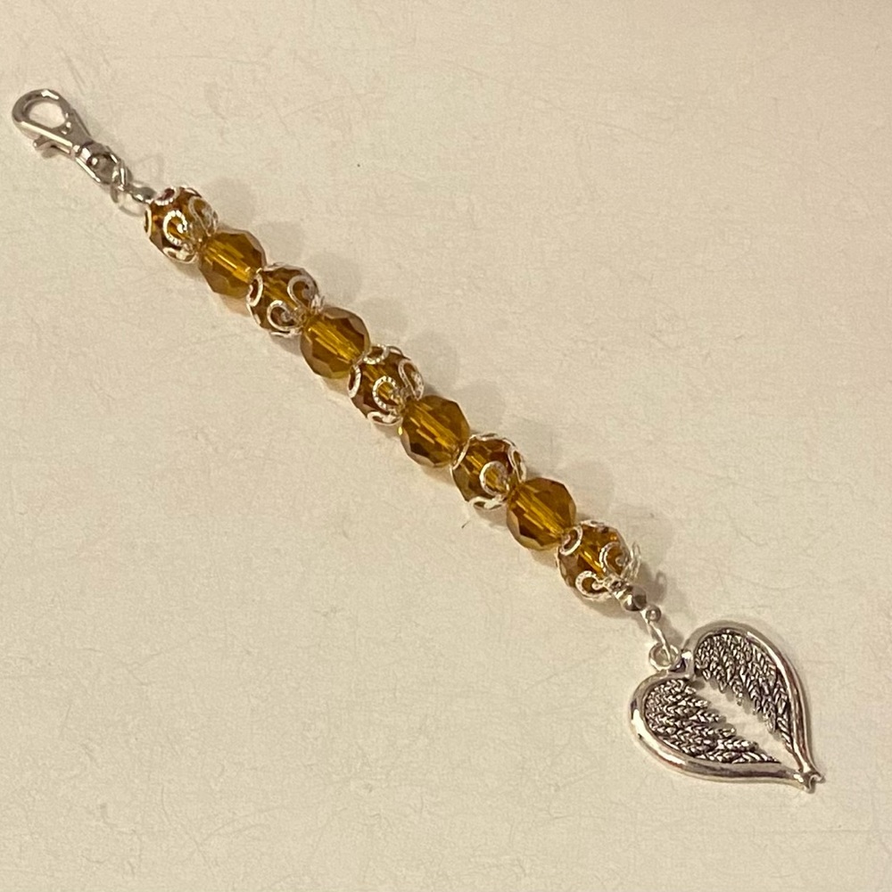 2/$20. NEW  Angel wings key chain!